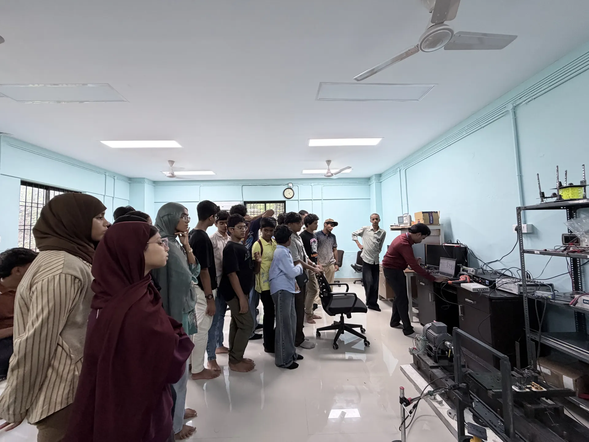 Students visiting an NIT electronics research lab