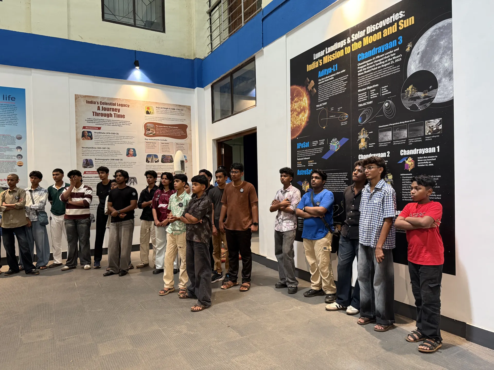 Students on a guided space-research exhibit tour