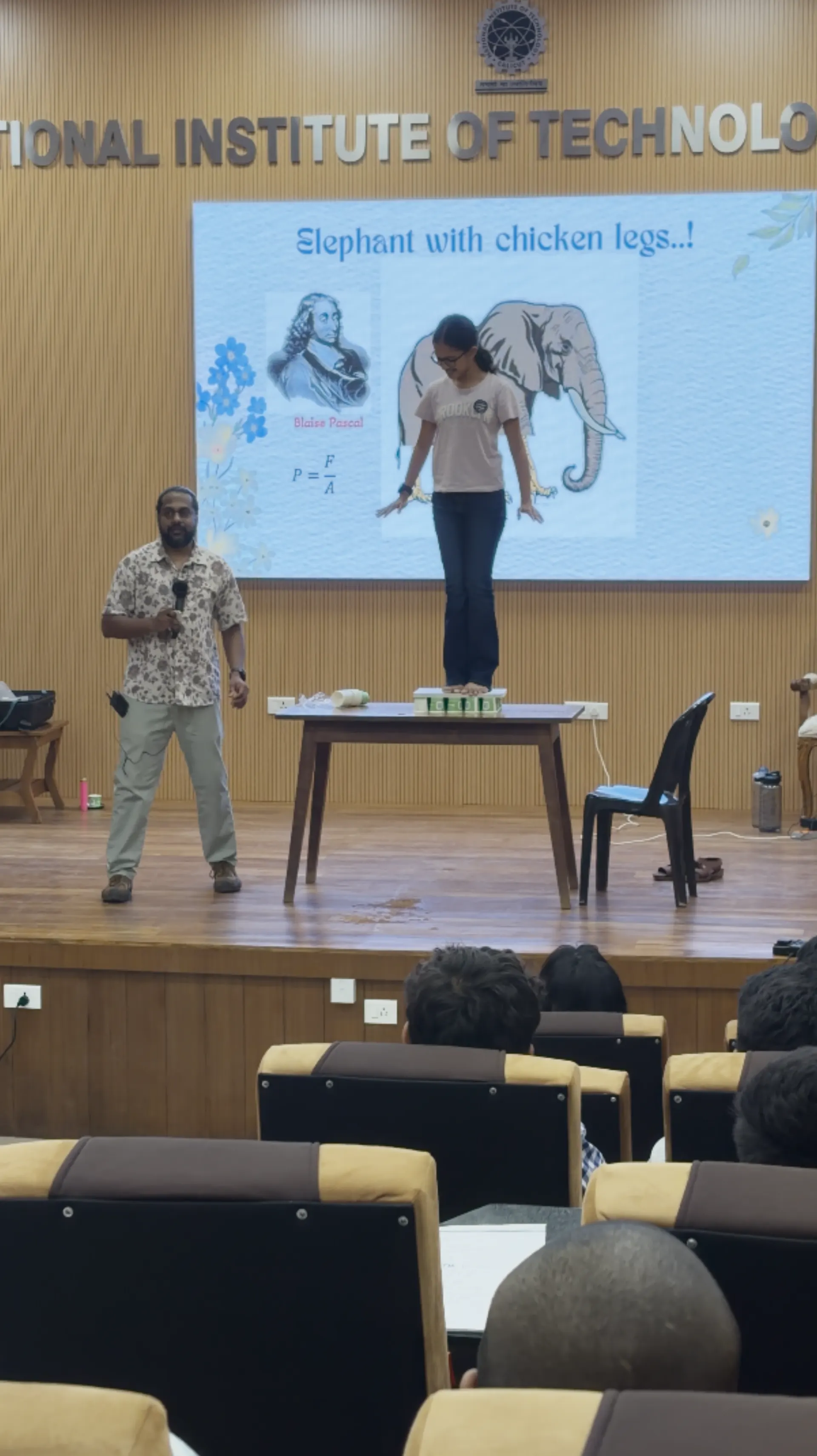 Live physics demonstration on stage